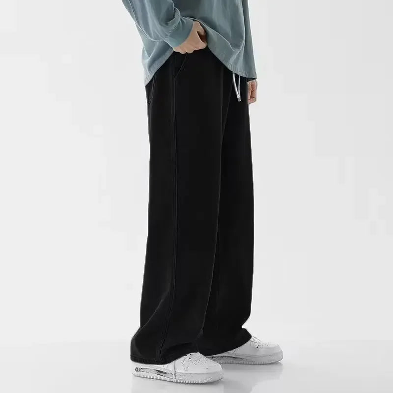 Men's baggy wide-leg Y2K denim jeans by Jelieora Venture, showcasing relaxed fit and vintage-inspired wide-leg silhouette.