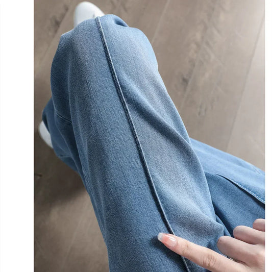 Women’s high waist wide-leg jeans by Jelieora Venture, showcasing the relaxed fit and stylish silhouette on a model.