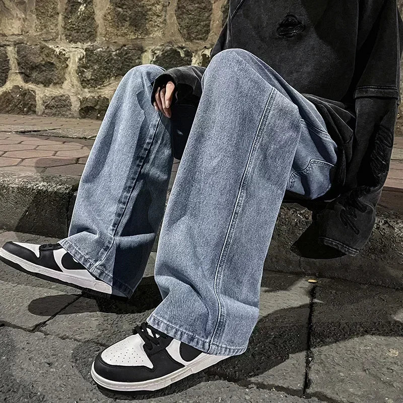Men's wide-leg streetwear jeans by Jelieora Venture, showing relaxed fit and stylish denim design with a casual streetwear look.