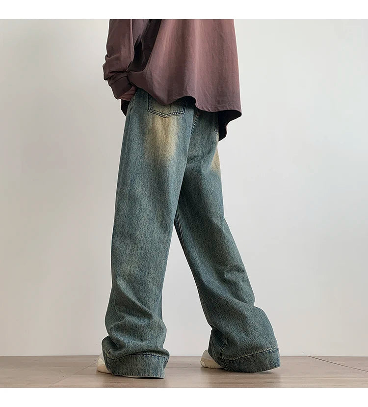 Men's distressed wide leg baggy jeans by Jelieora Venture, showing relaxed fit with rips and faded details in a casual style.