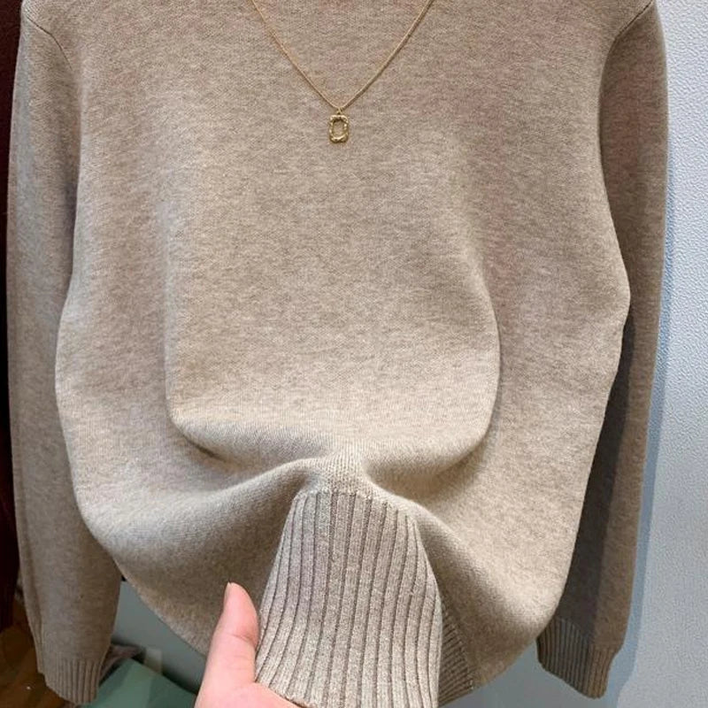 Women's navy turtleneck knit pullover sweater by Jelieora Venture, featuring a cozy, ribbed design and classic fit.
