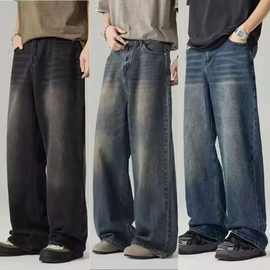 Men's distressed wide leg jeans by Jelieora Venture, showing the faded denim with ripped details and relaxed fit.