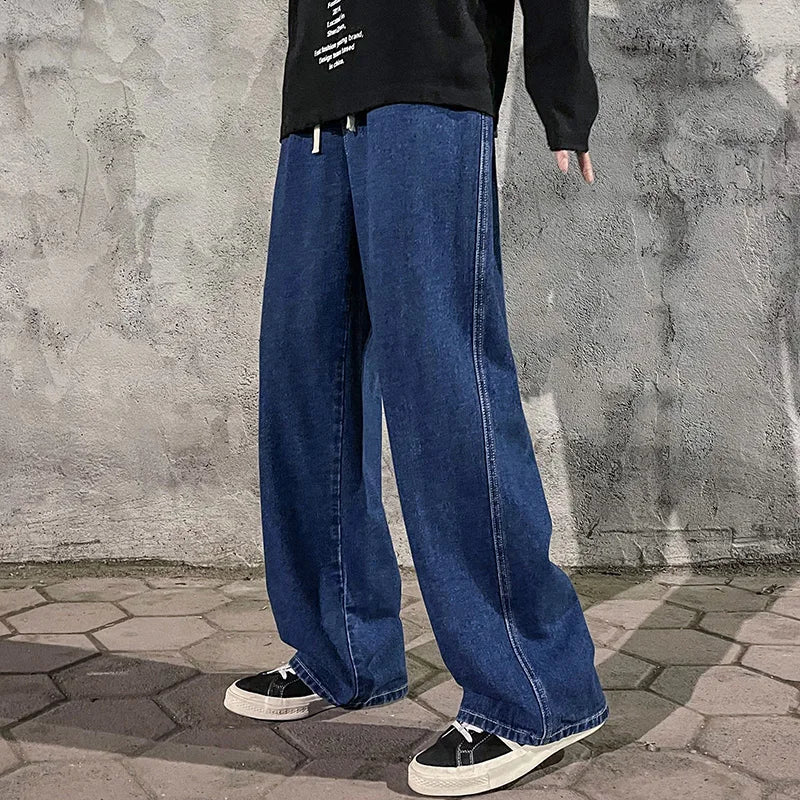 Men's wide-leg streetwear jeans by Jelieora Venture, featuring a relaxed fit and classic denim look.