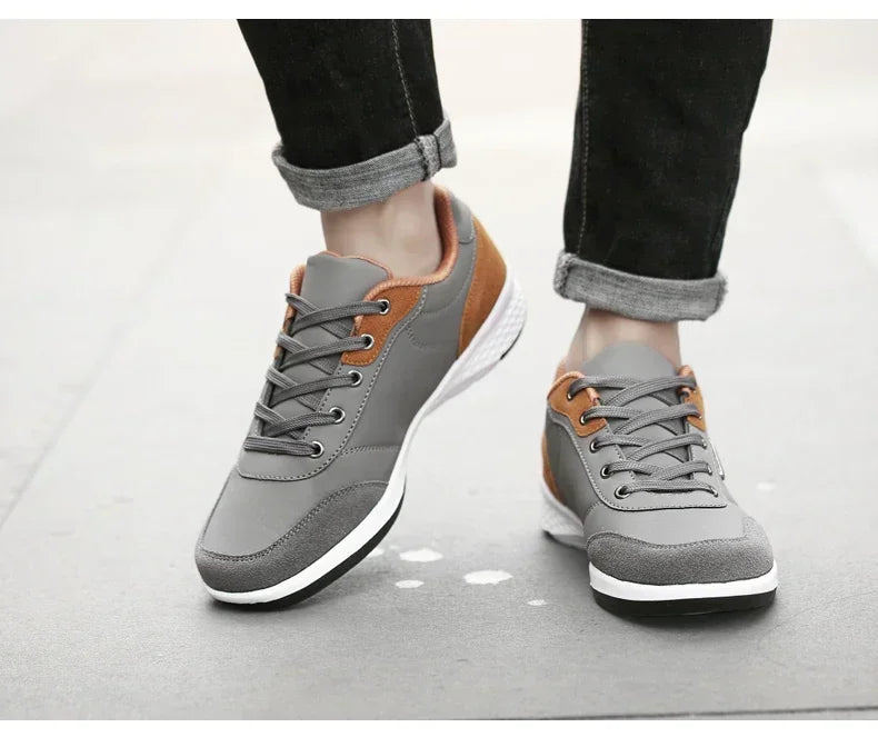 Men's waterproof trainers by Jelieora Venture, featuring durable design and slip-resistant soles for outdoor activities.