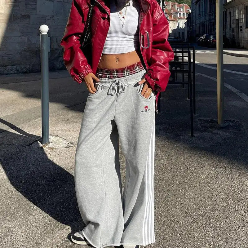 Women's college tracksuit set by Jelieora Venture, featuring a stylish hoodie and matching joggers in comfortable fabric.