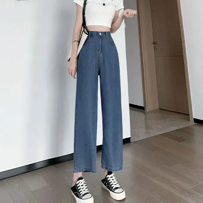 Women's high waist wide leg jeans by Jelieora Venture, showing the relaxed fit and classic denim style with pockets and belt loops.