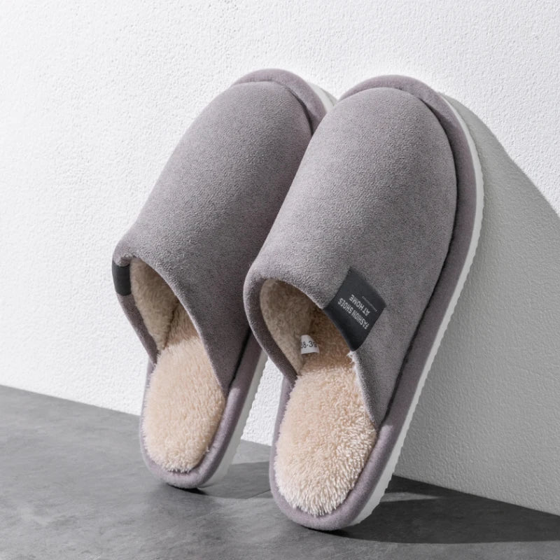 Men's warm house slippers by Jelieora Venture with plush lining and slip-resistant soles for cozy indoor comfort.