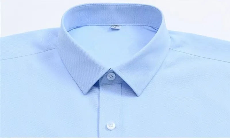 Men's plus size dress shirt by Jelieora Venture, in a classic style with a button-down collar, displayed on a hanger.