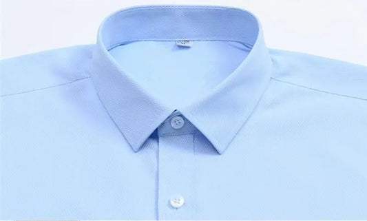 Men's plus size dress shirt by Jelieora Venture, in a classic style with a button-down collar, displayed on a hanger.