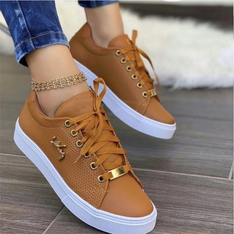 Women's lace-up vulcanized flat sneakers by Jelieora Venture, featuring classic design and comfortable rubber sole.