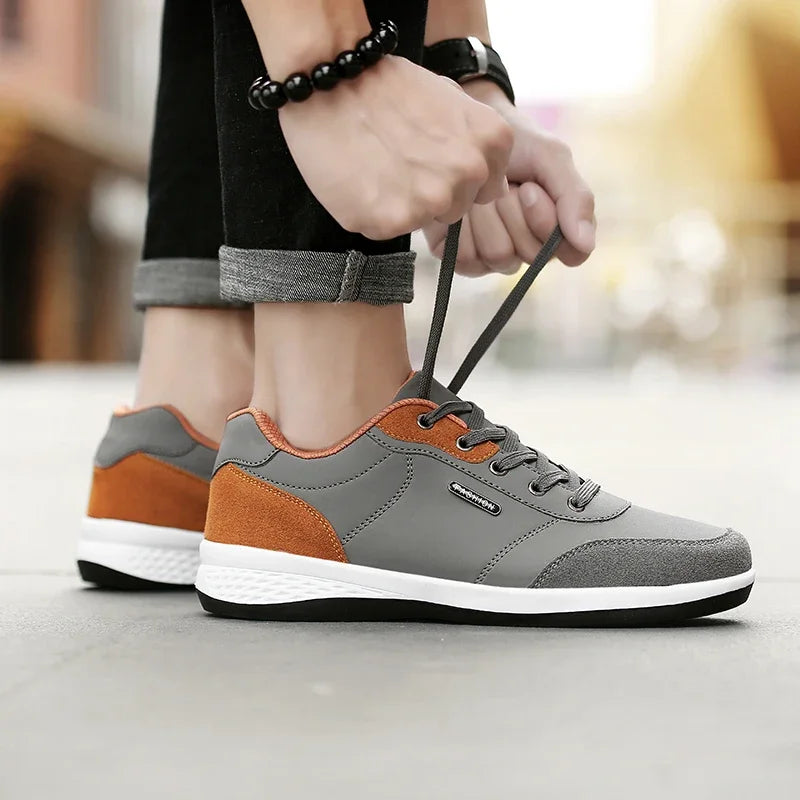 Men's waterproof trainers by Jelieora Venture featuring durable material and slip-resistant soles for outdoor activities.