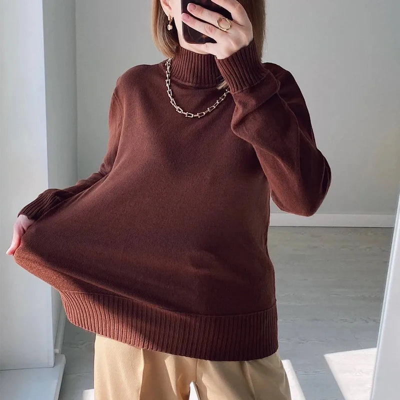 Women’s navy turtleneck knit pullover sweater by Jelieora Venture, featuring a cozy, fitted design with ribbed cuffs and neckline.