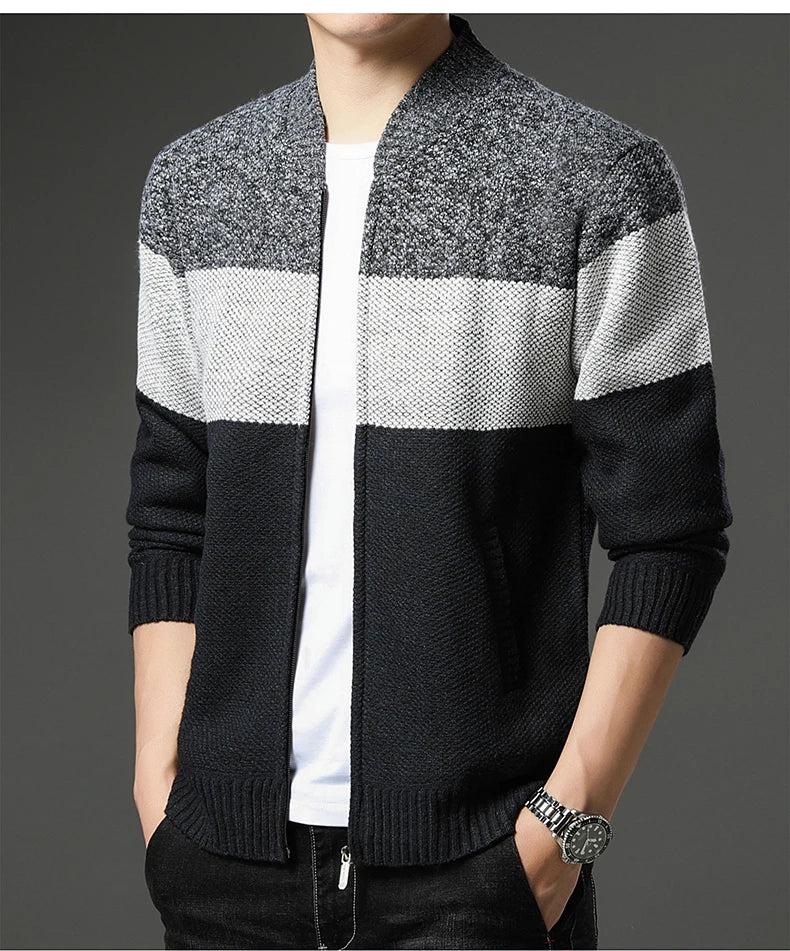 Men's knitted cardigan jumper by Jelieora Venture, featuring a cozy, textured knit design in neutral tones.