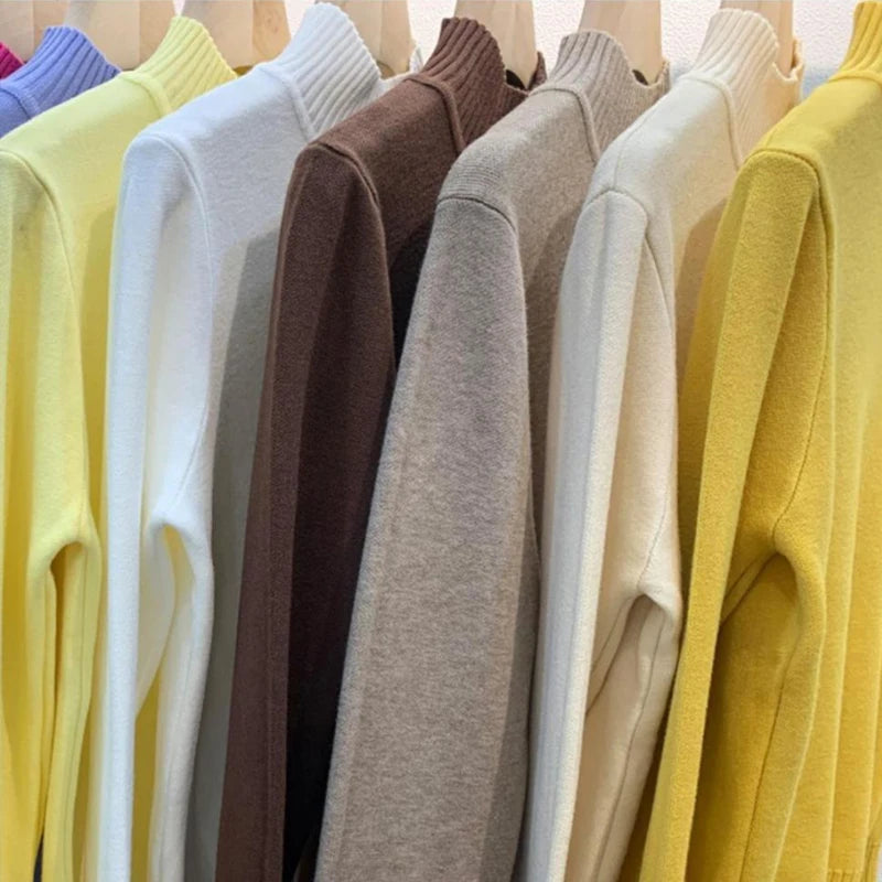 Women's turtleneck knit pullover sweater by Jelieora Venture, showing a cozy, fitted top in a neutral color.