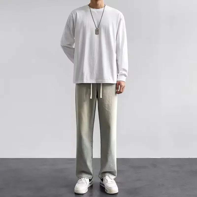 Men's baggy wide-leg Y2K denim jeans by Jelieora Venture, showcasing relaxed fit and vintage-inspired style.