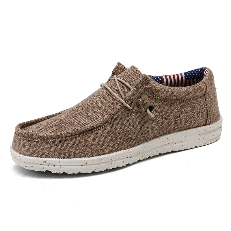 Men's denim canvas trainers by Jelieora Venture, featuring casual style with white rubber soles and laced-up design.