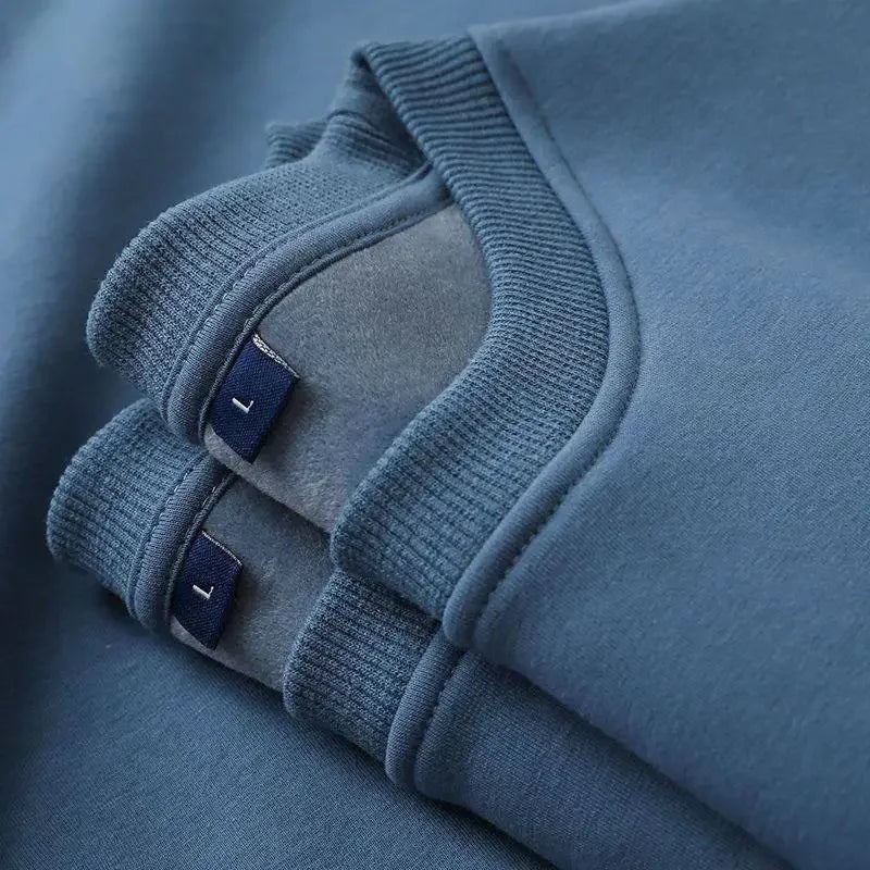 Unisex oversized fleece sweatshirt by Jelieora Venture featuring a relaxed fit and soft fleece fabric in neutral color.