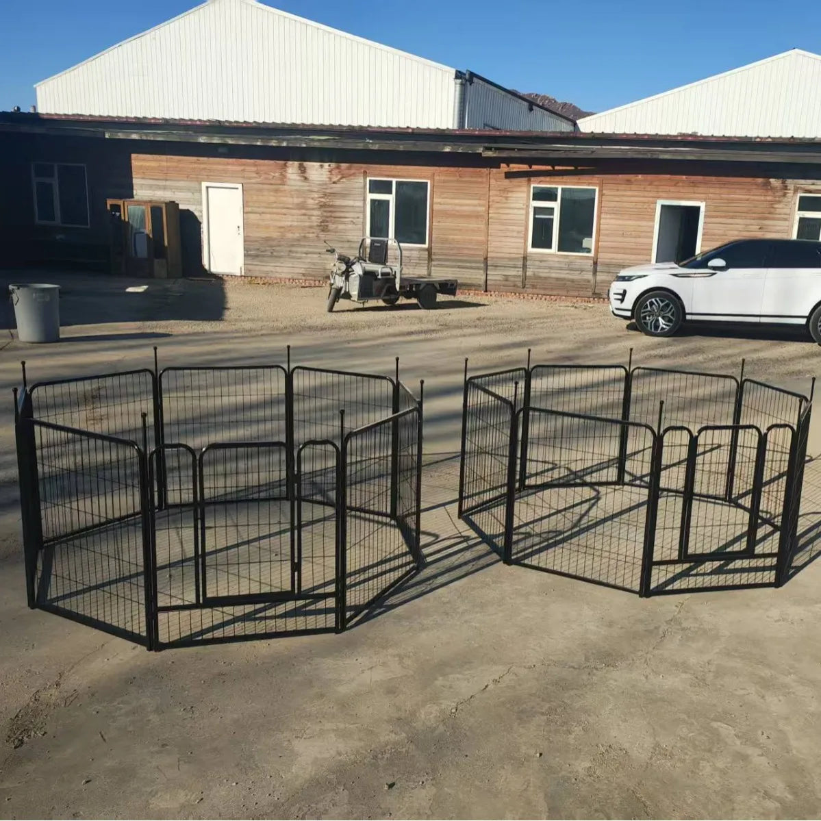 Jelieora Venture heavy-duty dog playpen with ground stakes, indoor/outdoor pet fence for puppy safety and containment.