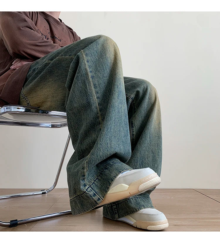 Men's distressed wide leg baggy jeans by Jelieora Venture, featuring a relaxed fit and stylish distressed detailing.