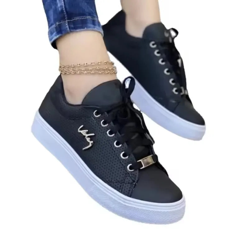 Women's lace-up vulcanized flat sneakers by Jelieora Venture, featuring a casual design with white rubber soles and lace-up closure.