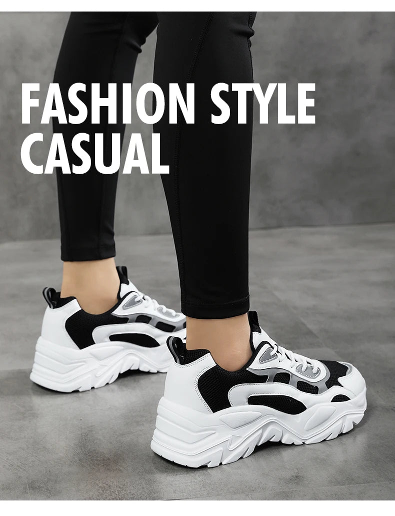 Women's vulcanised platform chunky sneakers by Jelieora Venture with black and white design, showcasing thick rubber soles and stylish detail.