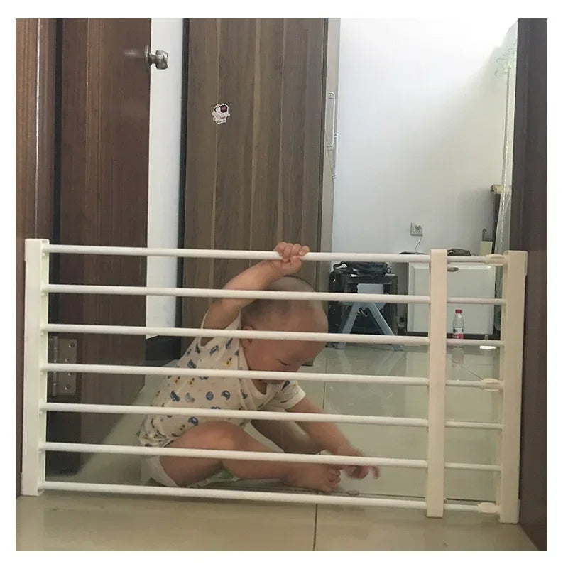 Jelieora Venture retractable pet safety gate extending open, made of durable mesh and plastic for pet barrier and safety.
