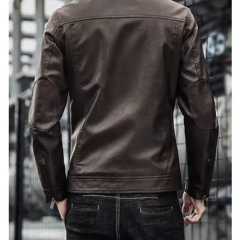 Men's black faux leather biker jacket by Jelieora Venture, featuring a classic collar, zipper front, and quilted shoulder details.