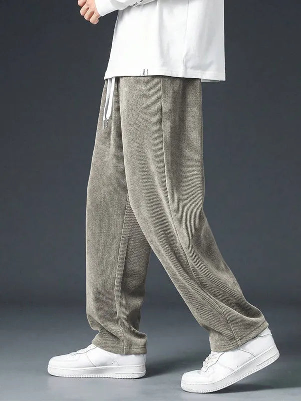 Men's straight leg corduroy trousers by Jelieora Venture, showing the fit and texture of the classic, stylish men's trousers.