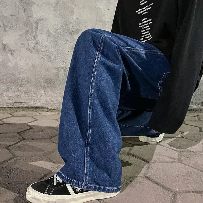 Men's wide-leg streetwear jeans by Jelieora Venture featuring relaxed fit and classic denim design.