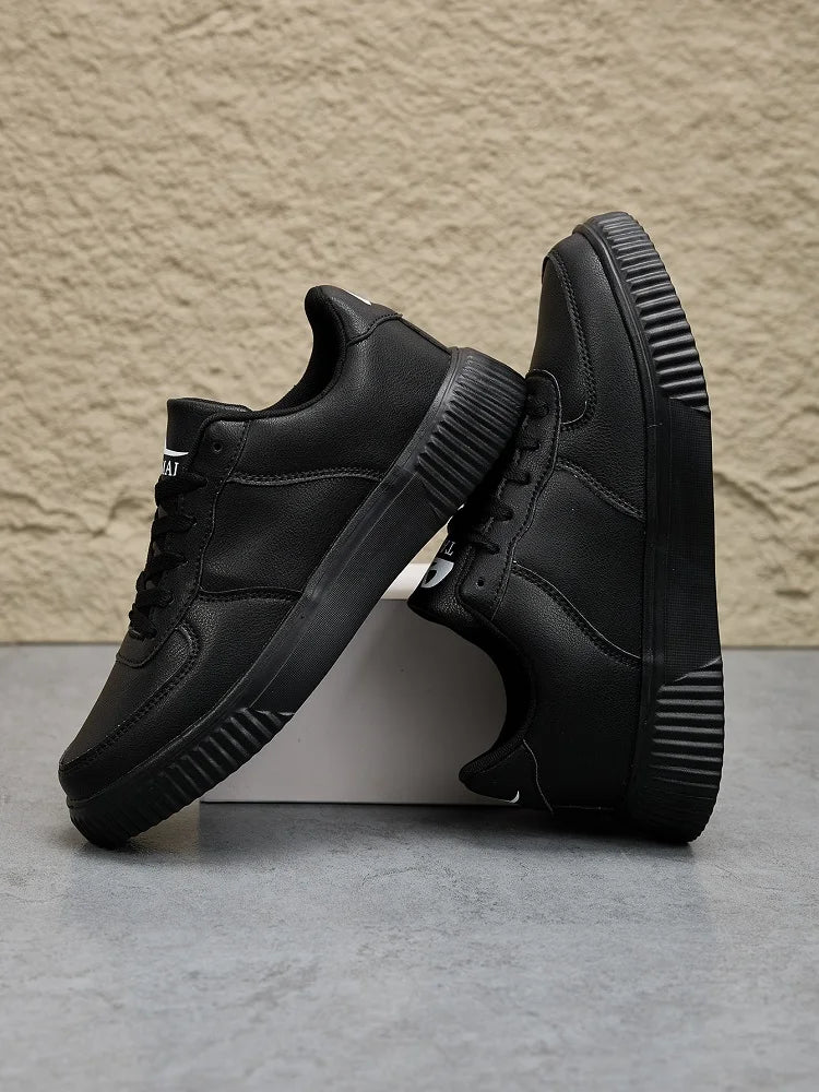 Men's white leather sneakers by Jelieora Venture featuring clean design and white laces, displayed on a neutral background.
