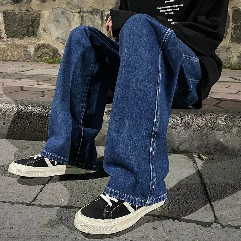 Men's wide-leg streetwear jeans by Jelieora Venture, showing relaxed fit and stylish design in a neutral color.