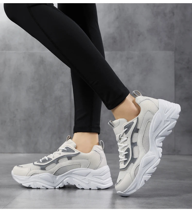 Women's Vulcanised Platform Chunky Sneakers by Jelieora Venture, showcasing black slip-on footwear with thick soles and modern style.