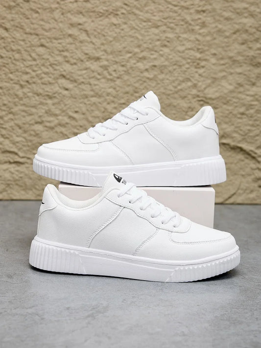 Men's white leather sneakers by Jelieora Venture, featuring a sleek design and comfortable fit for casual wear.