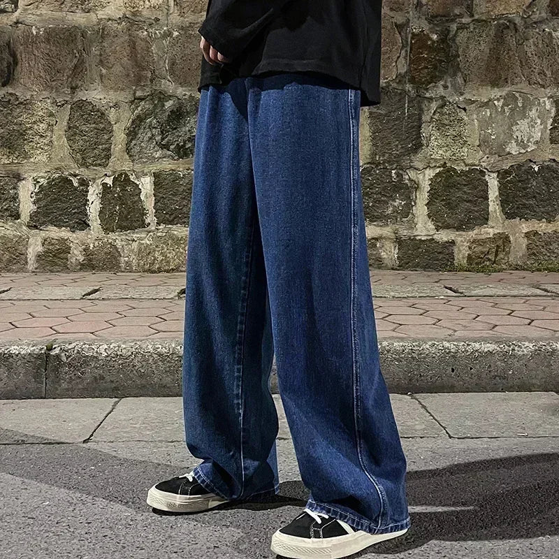 Men's wide leg streetwear jeans by Jelieora Venture, showcasing relaxed fit and classic denim style.