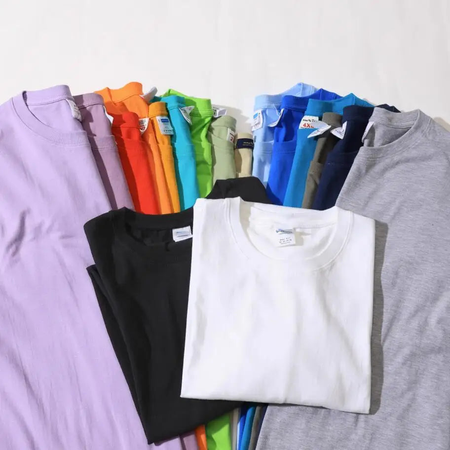 Men's solid basic hip hop cotton T-shirt by Jelieora Venture, available in 22 colors, shown in black with crew neckline.