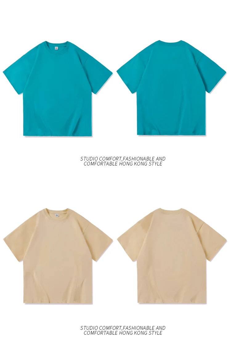 Men's solid basic cotton hip hop T-shirt by Jelieora Venture in black, displayed on a hanger with a plain background.