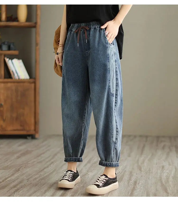 Women's denim harem pants by Jelieora Venture featuring a relaxed fit, elastic waistband, and stylish casual design.