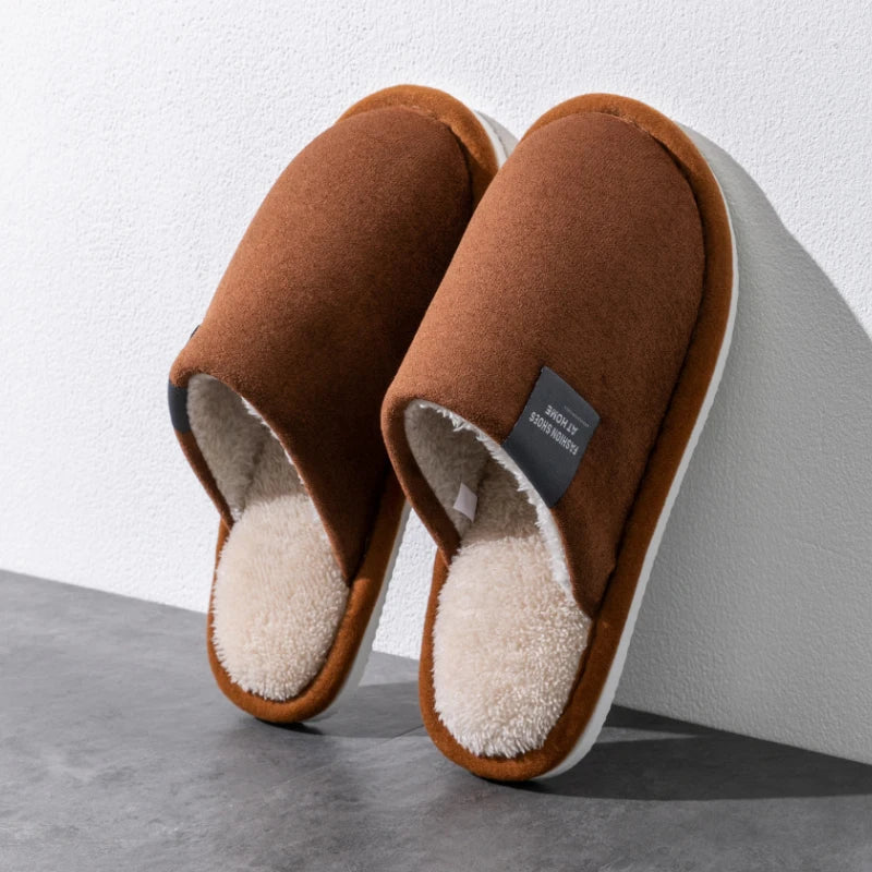Men's warm house slippers by Jelieora Venture featuring soft fabric and cozy sole for indoor comfort.