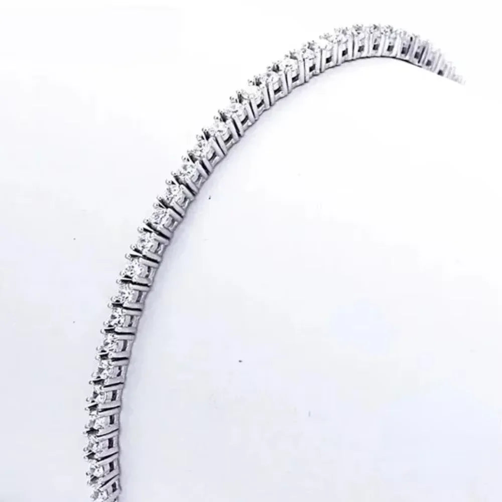 Sterling silver Jelieora Venture tennis bracelet with 2.5mm zirconia stones, adjustable 16-19cm, perfect for anniversary jewelry.