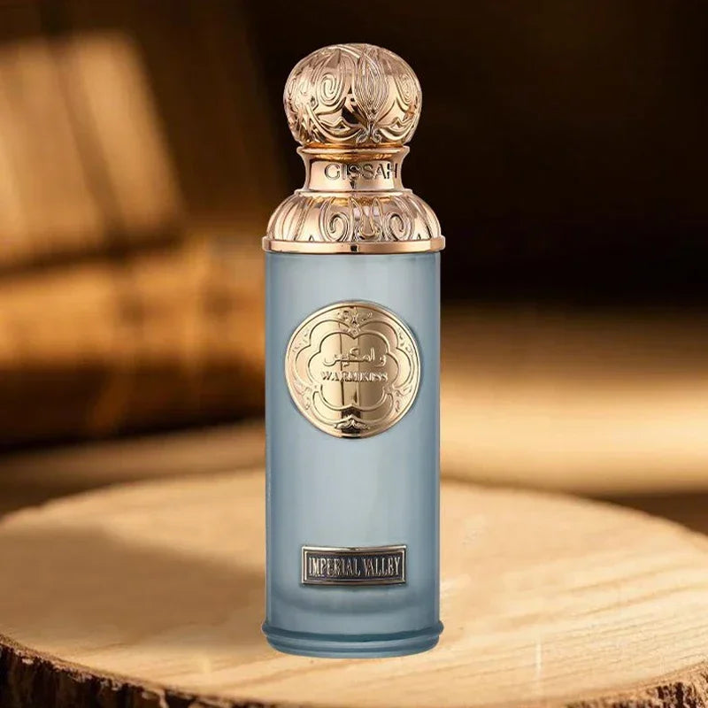 Unisex Arabic perfume spray by Jelieora Venture featuring a woody fragrance and elegant bottle design.
