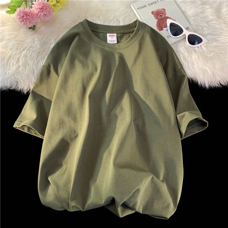 Men's solid basic hip hop cotton T-shirt by Jelieora Venture, available in 22 colors, shown in black with a relaxed fit.