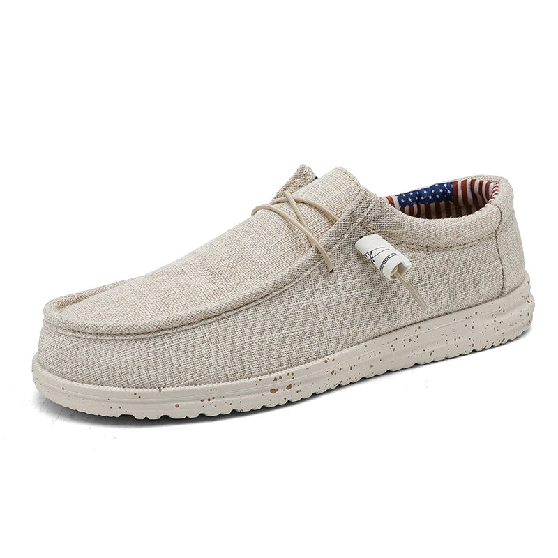 Men's denim canvas trainers by Jelieora Venture featuring casual design and white rubber soles.
