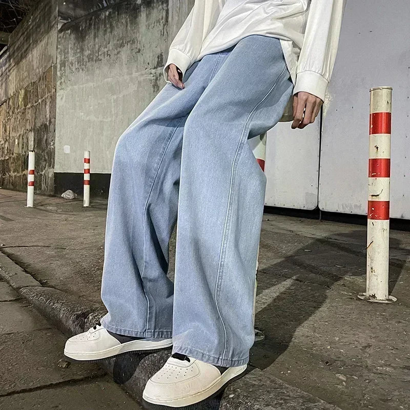 Men's wide leg streetwear jeans by Jelieora Venture featuring a relaxed fit and classic denim style.
