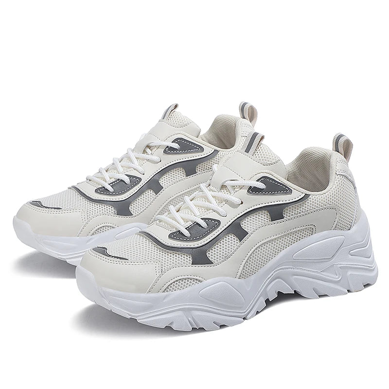 Women's vulcanised platform chunky sneakers by Jelieora Venture with black and white design, showcasing thick soles and trendy style.