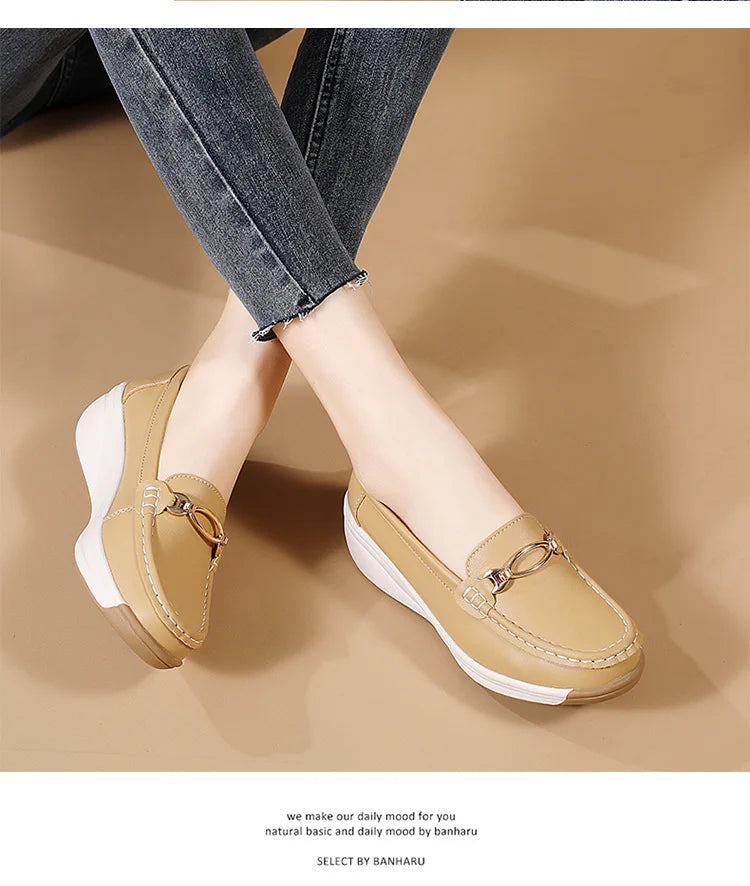 Women’s suede mule clogs with cork soles by Jelieora Venture, showcasing stylish slip-on footwear with a natural cork heel.