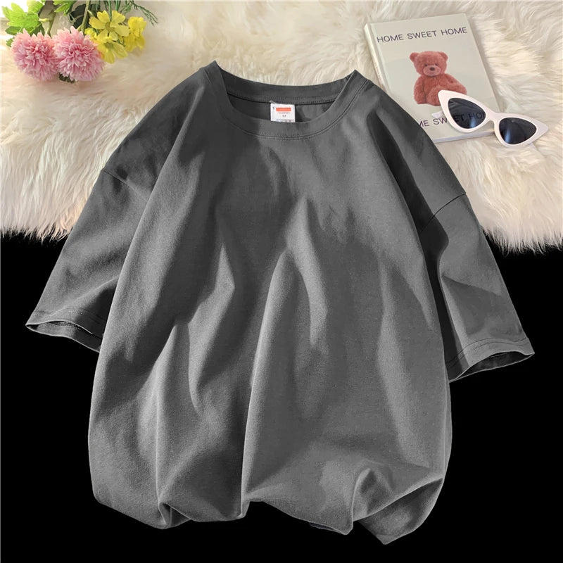 Men's solid basic hip hop cotton T-shirt by Jelieora Venture in various colors, displayed flat showing front view and fabric texture.