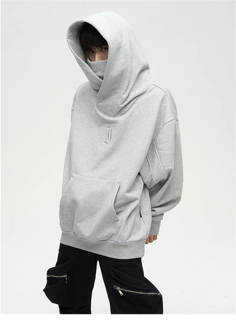 Men's turtleneck hoodie by Jelieora Venture featuring a cozy, fitted design in a neutral color with front pockets and ribbed cuffs.