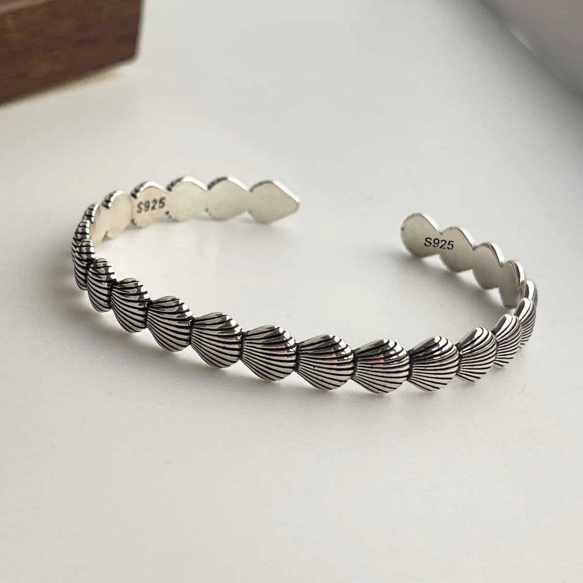 Sterling silver retro bracelet with vintage flower pattern, handmade jewelry for women and men by Jelieora Venture.