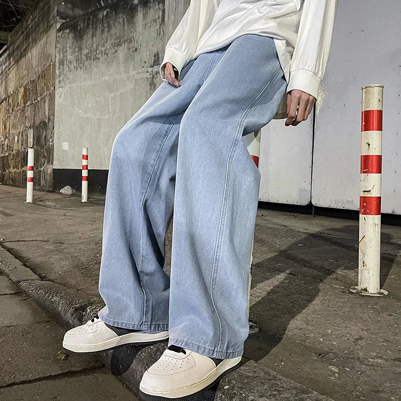 Men's wide leg streetwear jeans by Jelieora Venture, showcasing relaxed fit and stylish denim design.