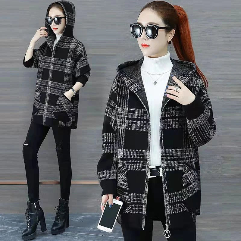 Women's plus size plaid fleece-lined coat by Jelieora Venture, shown in a cozy, warm, checkered design with a front zipper closure.